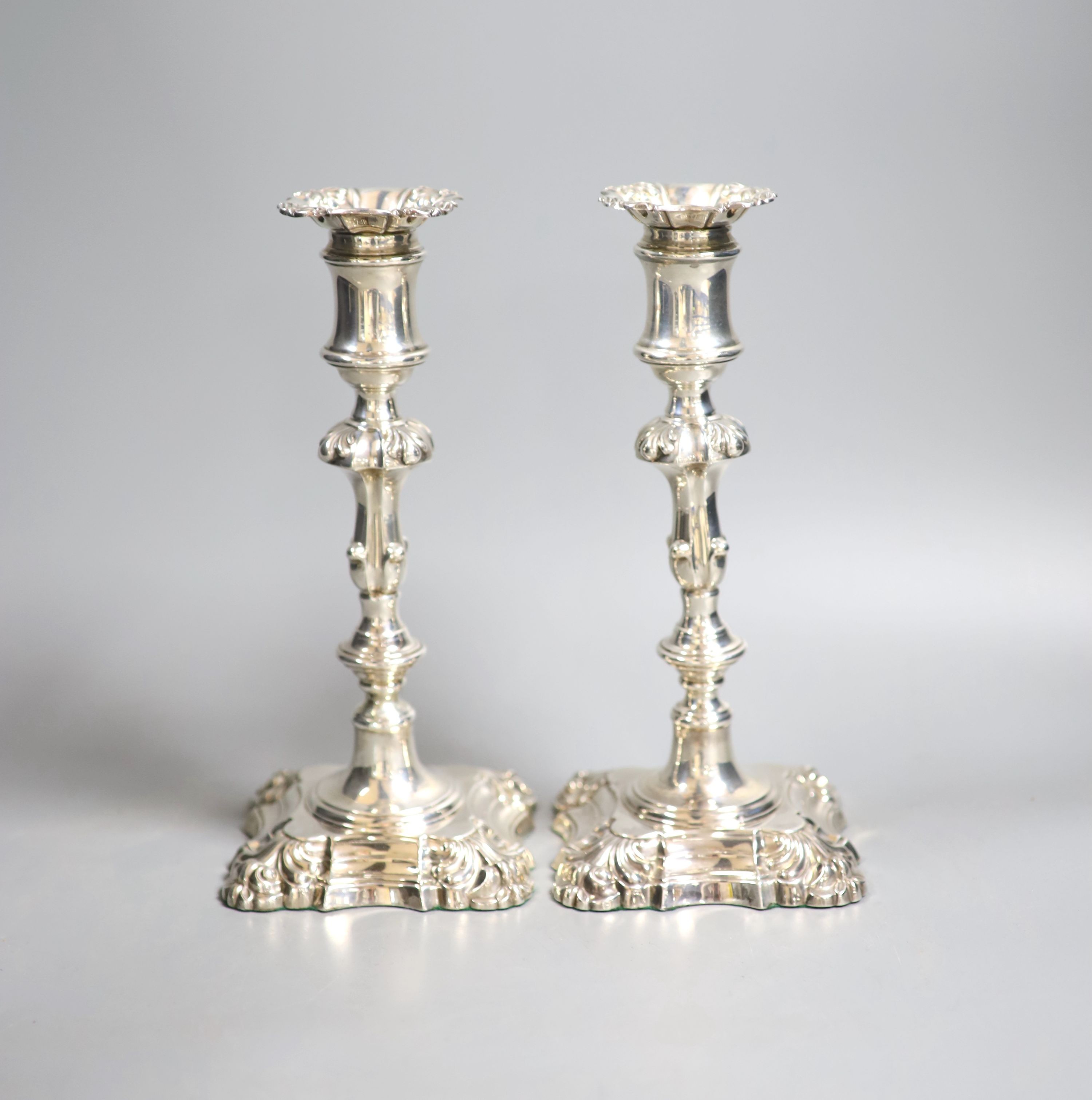 A pair of Victorian silver candlesticks, Henry Wilkinson & Co, London, 1867, (a.f.) 23.7cm, weighted.